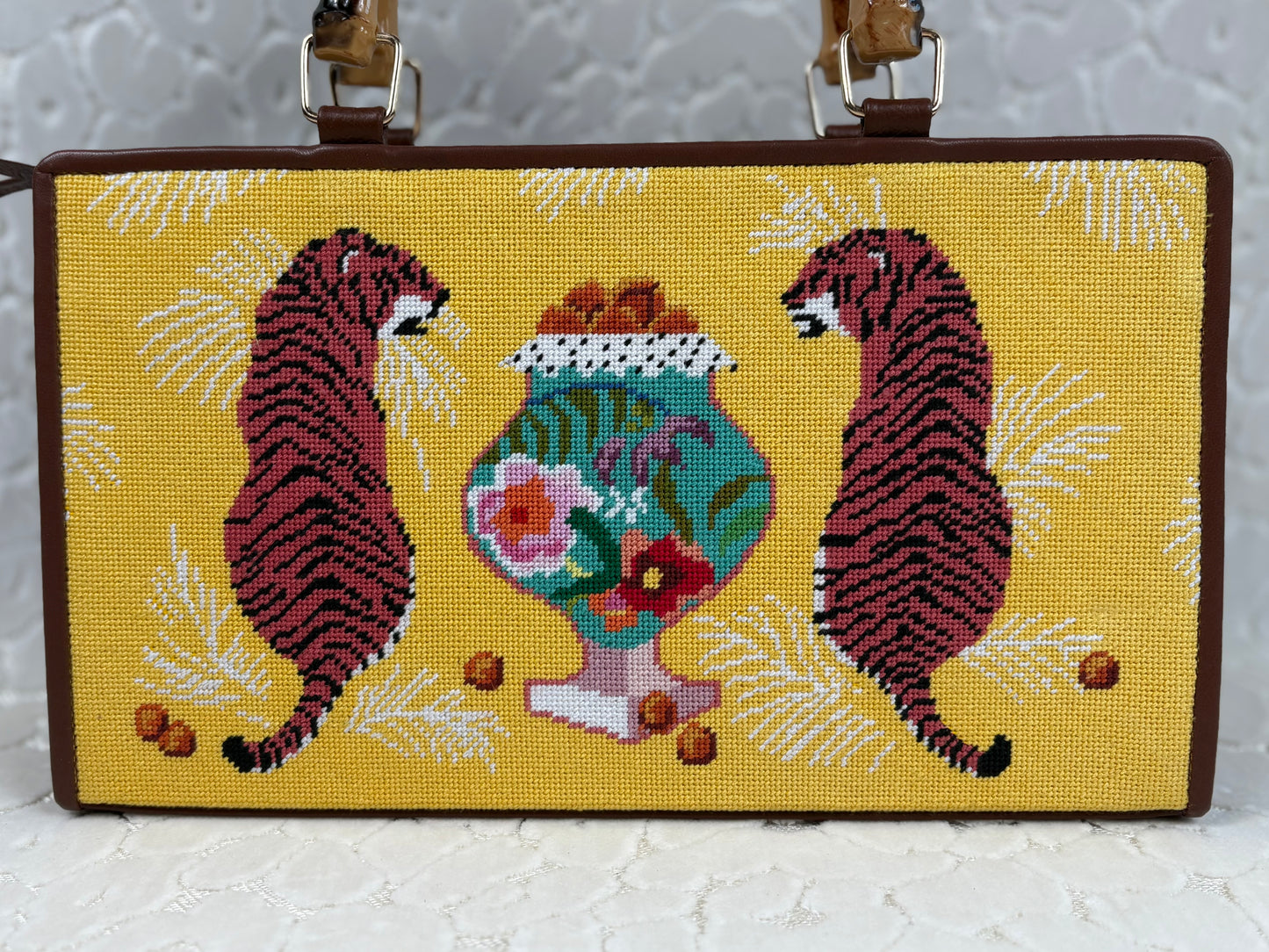 Two Tigers with Urn Clutch