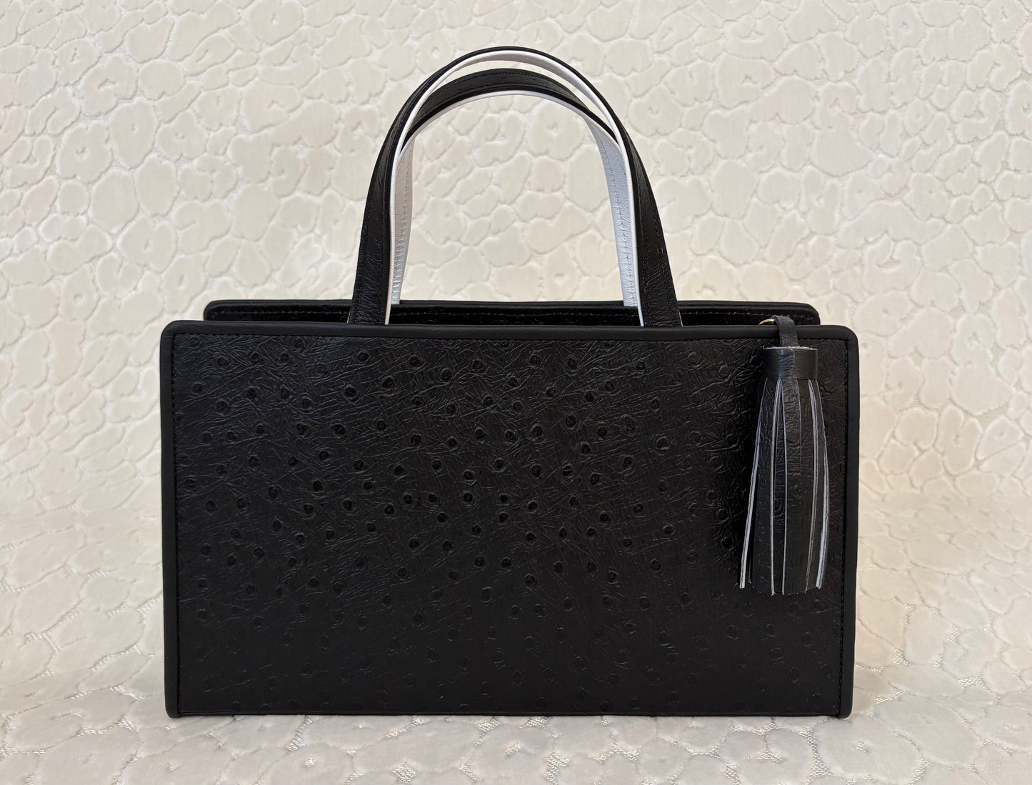 Regal Tiger Crest Clutch